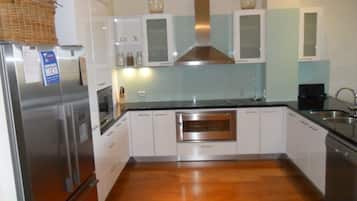Four Bedrooms City View Apartment | Private kitchen | Full-size fridge, microwave, stovetop, coffee/tea maker