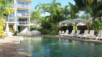 Outdoor pool, pool umbrellas, pool loungers