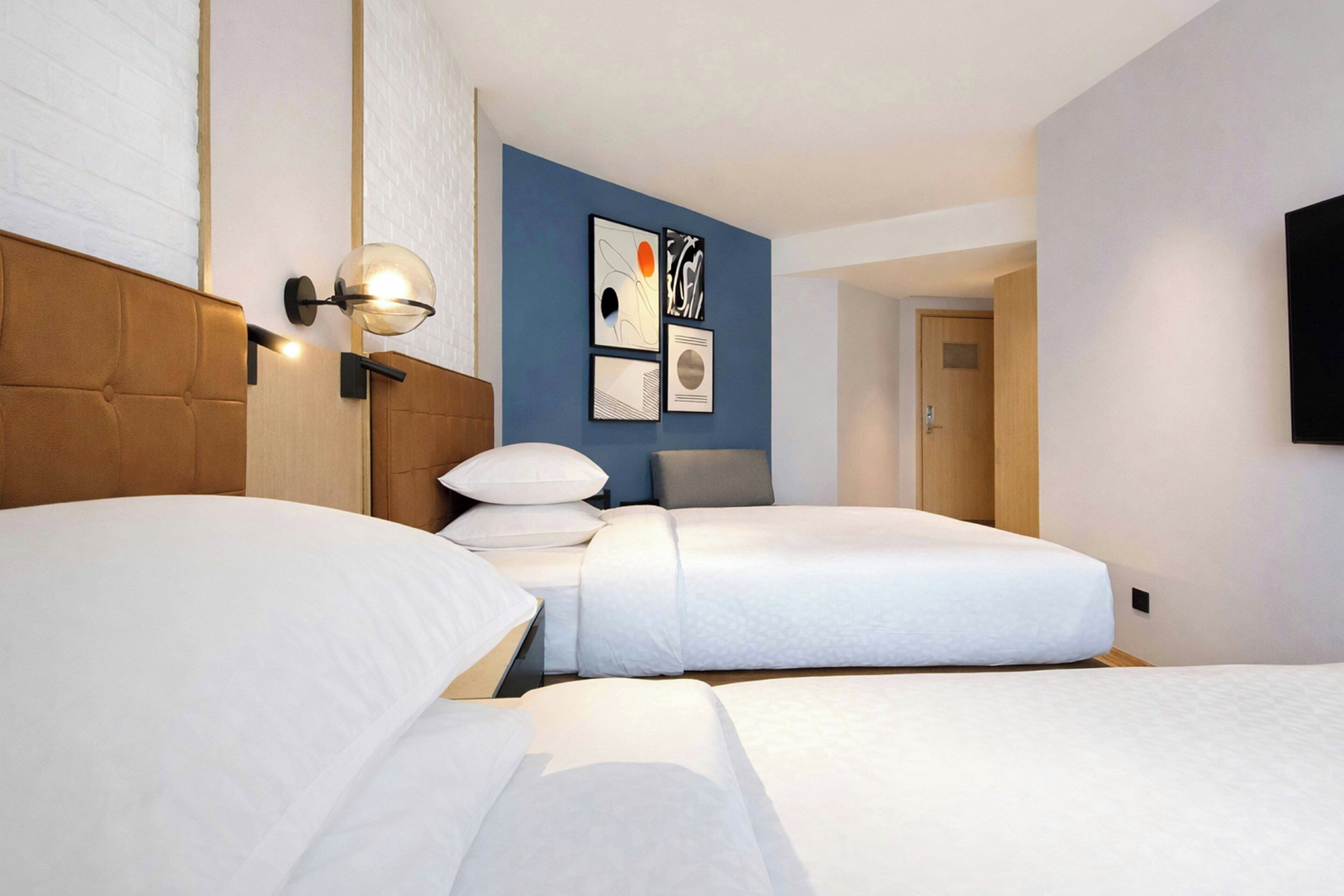 Habitación Deluxe, 2 camas individuales | Minibar, caja fuerte, cunas gratuitas y wifi gratis