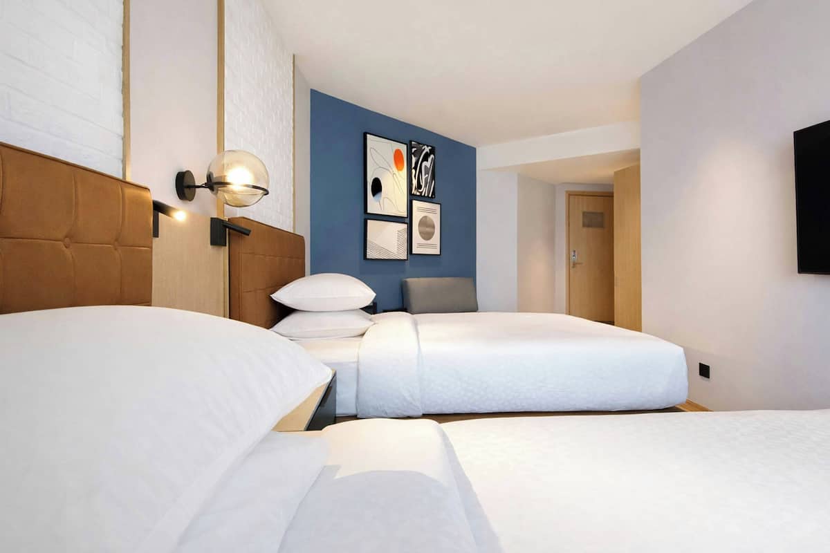 Deluxe Room, 2 Single Beds | Minibar, in-room safe, free cots/infant beds, free WiFi