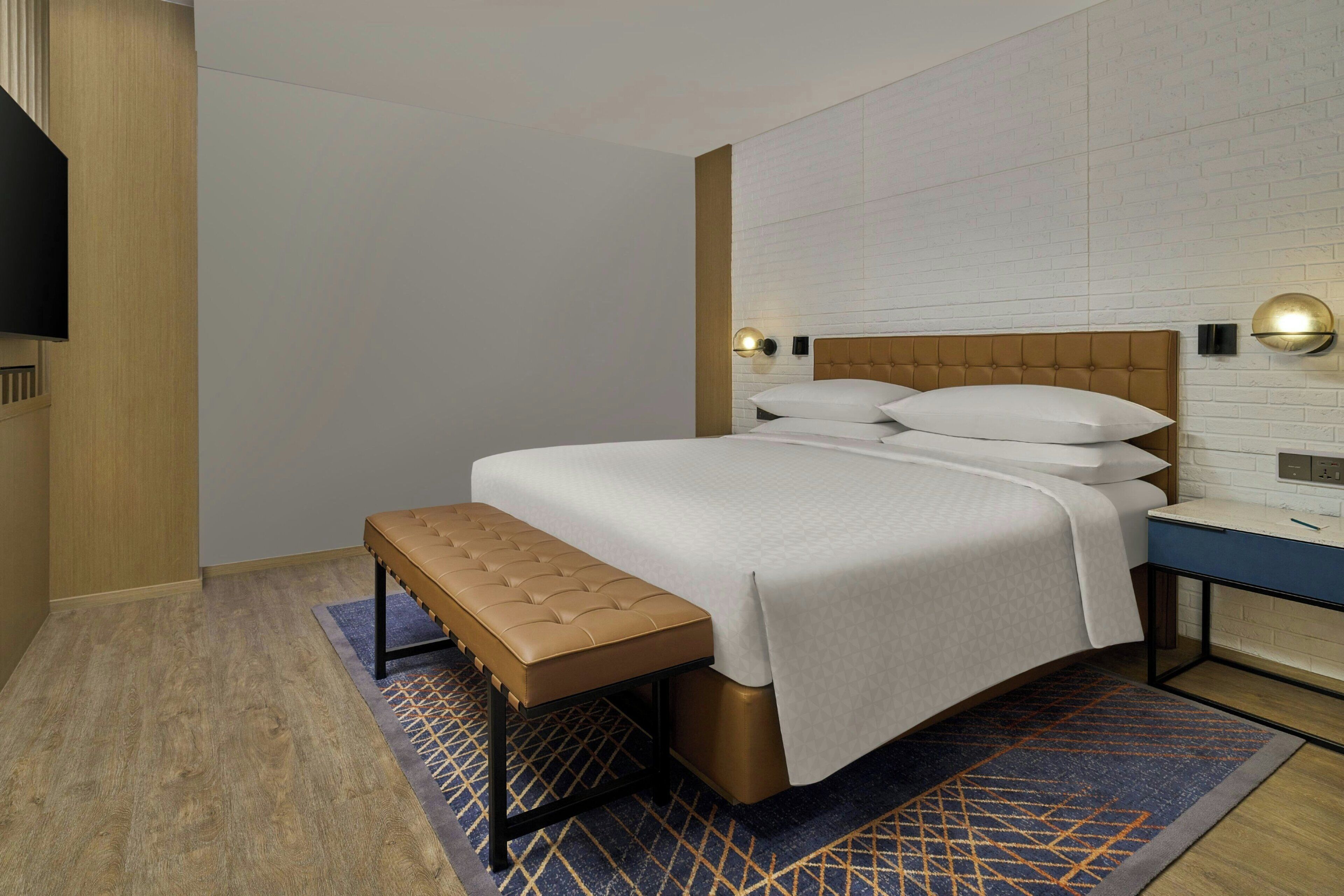 Habitación Deluxe, 1 cama King size, balcón | Minibar, caja de seguridad en la habitación y cunas gratuitas 