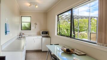 Family Room, Sea View | Private kitchenette