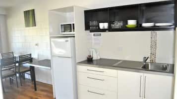 Microwave, coffee/tea maker, cookware/dishes/utensils