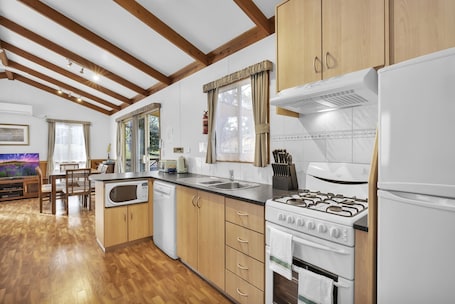 Three Bedroom Superior Villa | Private kitchen | Full-size fridge, microwave, stovetop, coffee/tea maker