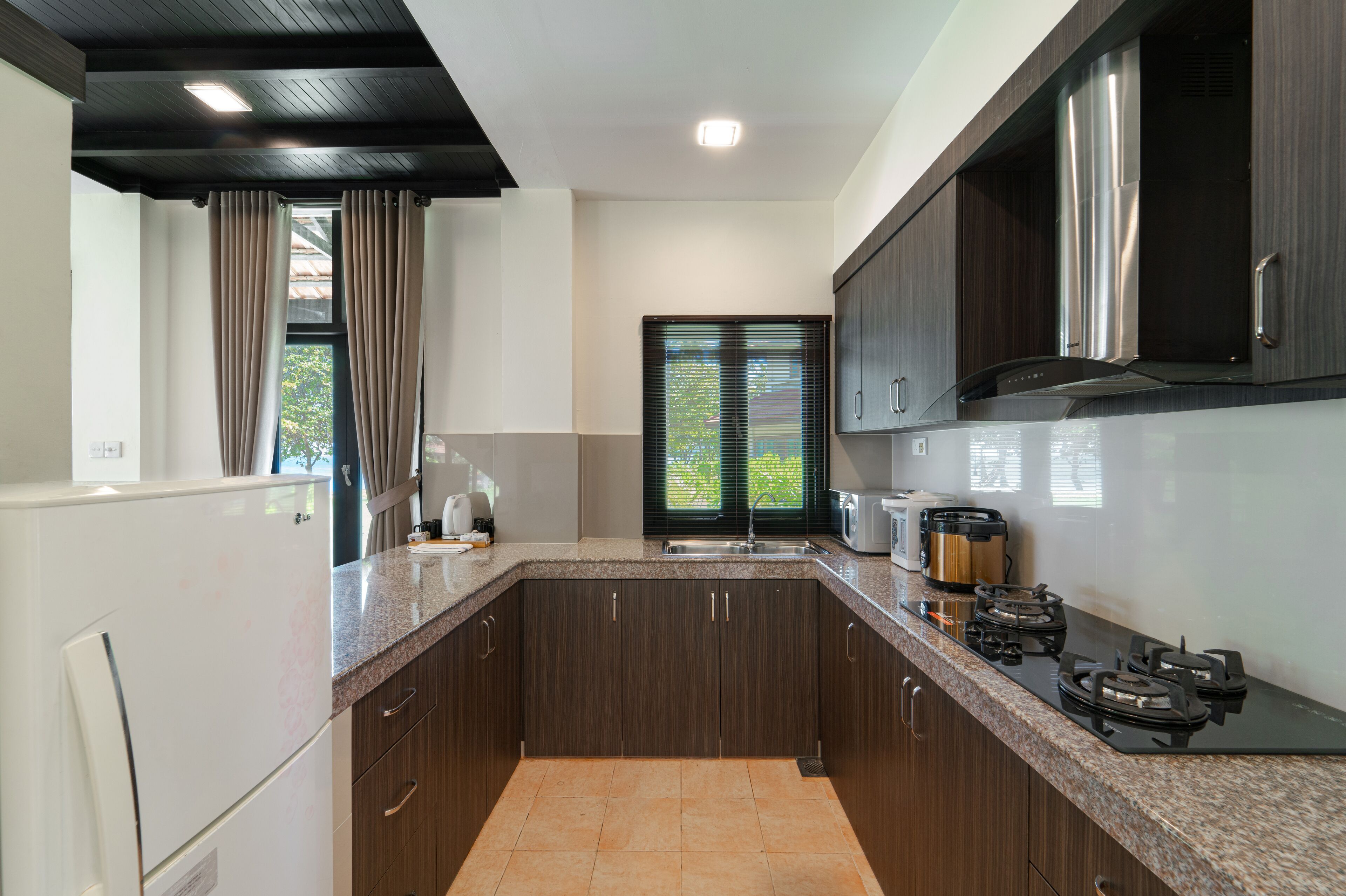 villa, 4 bedrooms, sea view | private kitchen | fridge, coffee/tea maker, electric kettle, dining tables