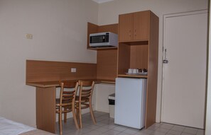 Downstairs Queen & 3 Singles | Private kitchenette