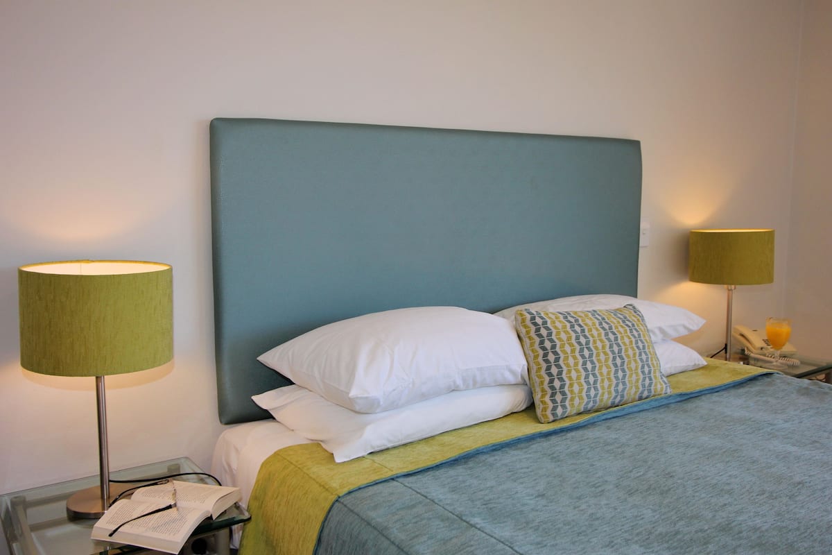1 bedroom, Egyptian cotton sheets, premium bedding, blackout curtains