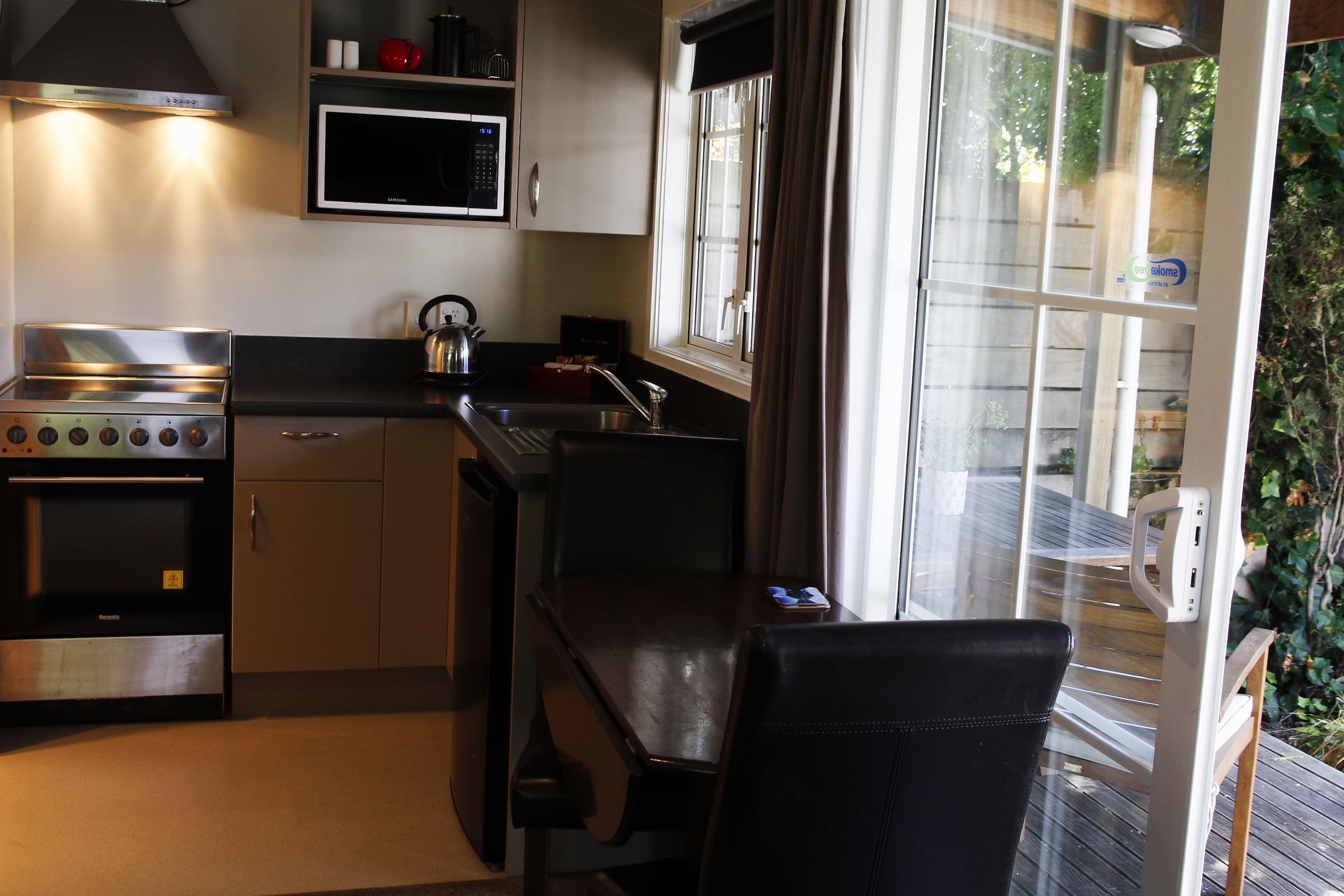 Superior Cottage | Private kitchen | Fridge, coffee/tea maker, electric kettle, high chair