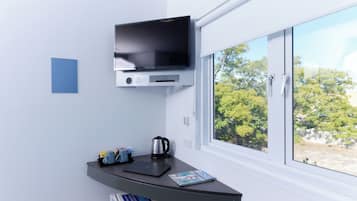 Quarto standard, 1 cama Queen | Comodidades do quarto