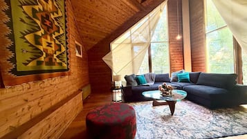 Main House (include Water Cottage) | Living area | Flat-screen TV