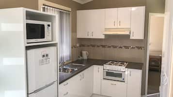 Luxury Villa, 2 Bedrooms | Private kitchenette | Full-sized fridge, microwave, stovetop, coffee/tea maker