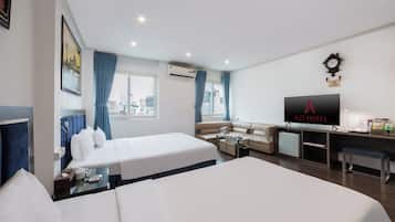 Family Double Room | Minibar, in-room safe, blackout curtains, iron/ironing board