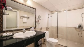 A bathroom with a sink, toilet, and shower. - A25 Hotel - 45B Giang Vo (Hanoi)