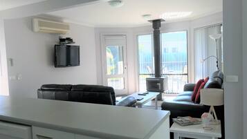 Luxury Townhome, 1 Bedroom | Living area | Flat-screen TV