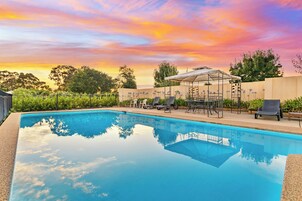 Outdoor pool, free pool cabanas, pool umbrellas