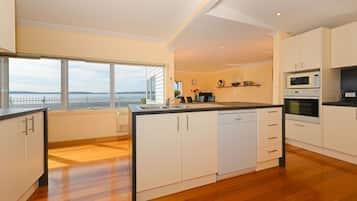 2 Bedroom Beachfront, Self-contained and Self-catering Apartment | Private kitchen