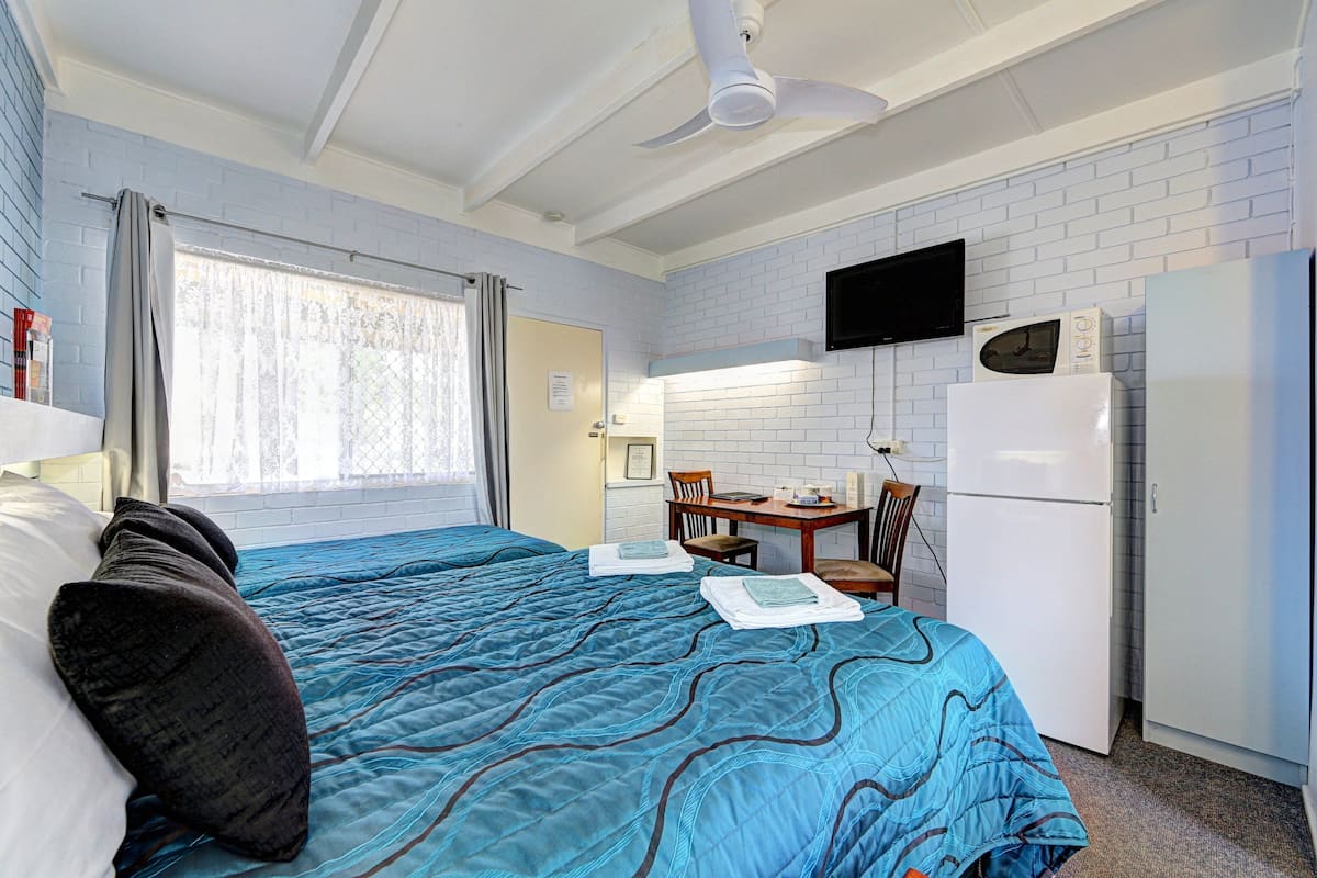 Habitación estándar | Ropa de cama de alta calidad y camas con pillow-top