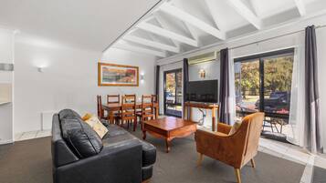 Apartment, 3 Bedrooms | Living area | LED TV, DVD player