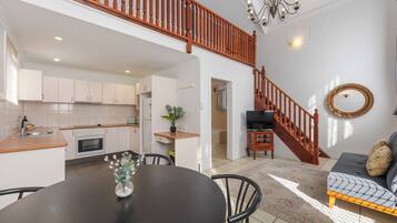 Apartment, 1 Bedroom | Living area | LED TV, DVD player
