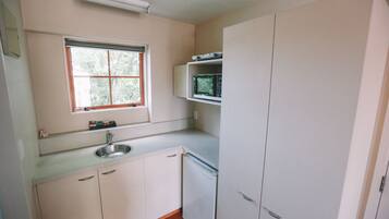 Mini-fridge, microwave, electric kettle, toaster