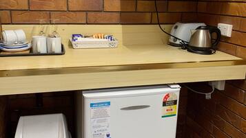 Deluxe Room, 1 King Bed | Coffee and/or coffee maker