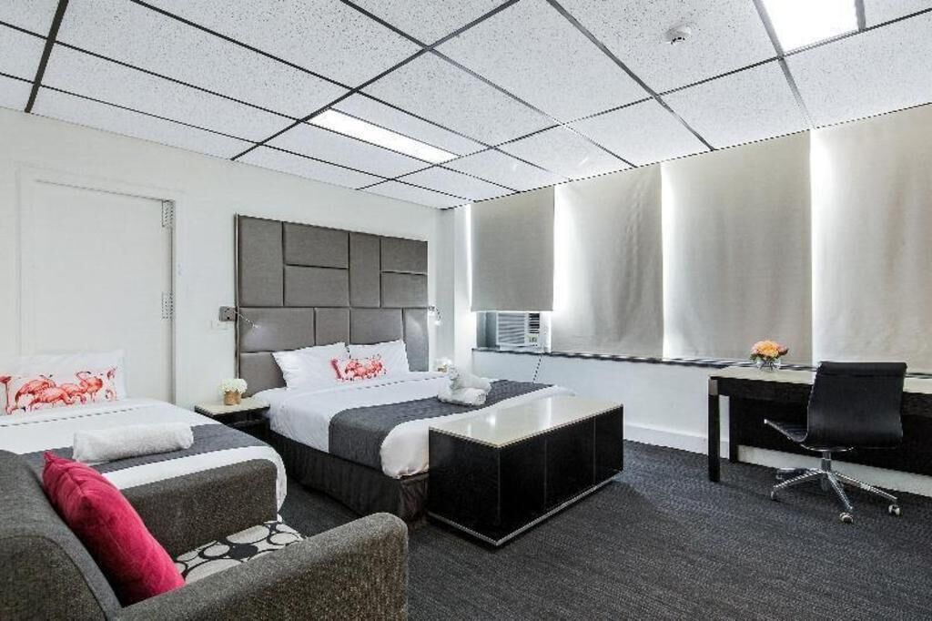 Ropa de cama de alta calidad y tabla de planchar con plancha 