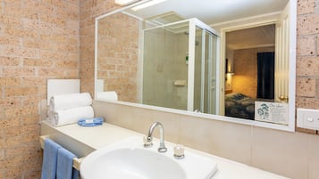 Shower, free toiletries, hair dryer, towels