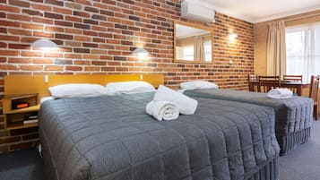 Family Room, Non Smoking, Kitchenette (2 Bedroom Family Suite) | Living area | 43-inch Smart TV with satellite channels, TV
