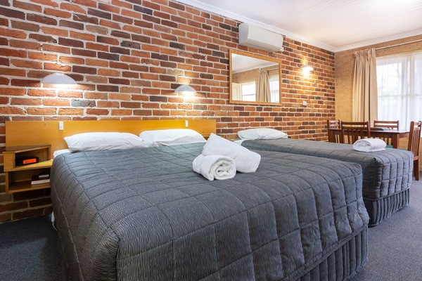 Family Room, Non Smoking, Kitchenette (2 Bedroom Family Suite) | Living area | 43-inch Smart TV with satellite channels, TV