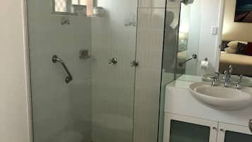 Shower, rainfall showerhead, designer toiletries, hair dryer