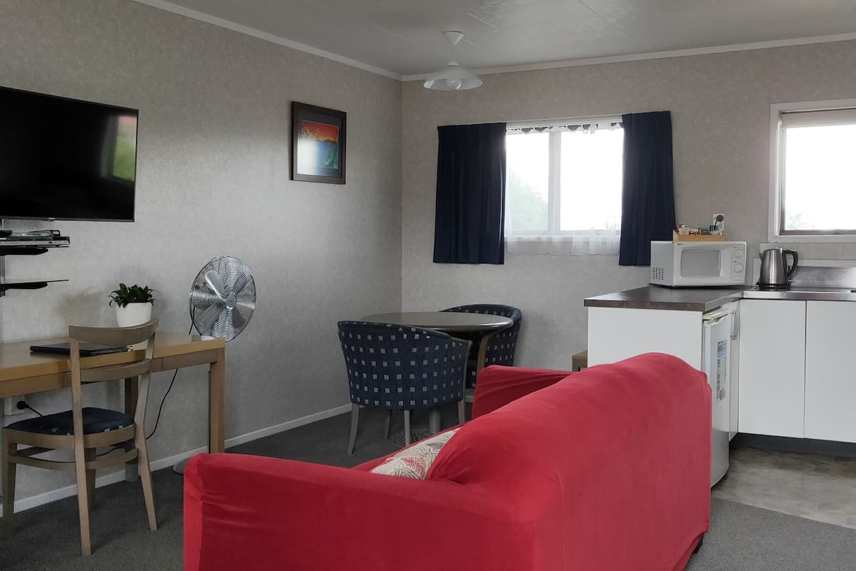 Blackout curtains, iron/ironing board, free WiFi, bed sheets