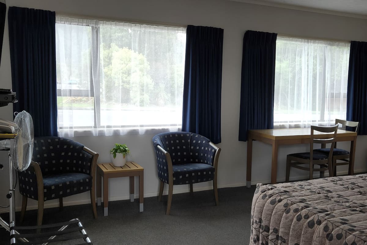 Blackout curtains, iron/ironing board, free WiFi, bed sheets