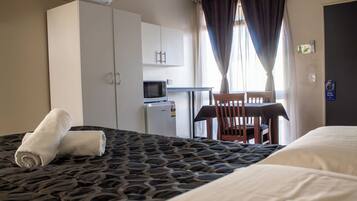 Laptop workspace, iron/ironing board, WiFi (free), bed sheets