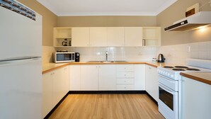Deluxe Apartment, 3 Bedrooms | Private kitchen | Espresso maker, coffee/tea maker, full-size fridge, microwave - The Beach Retreat Eden (Eden)