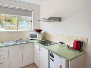 Fridge, coffee/tea maker, electric kettle, toaster