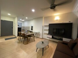 Studio, 2 Bedrooms | Living area | Flat-screen TV