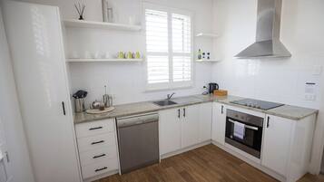 Standard Apartment, 2 Bedrooms, Non Smoking, Kitchen (Apartment 4) | Private kitchen | Coffee/tea maker, full-sized fridge, microwave, stovetop