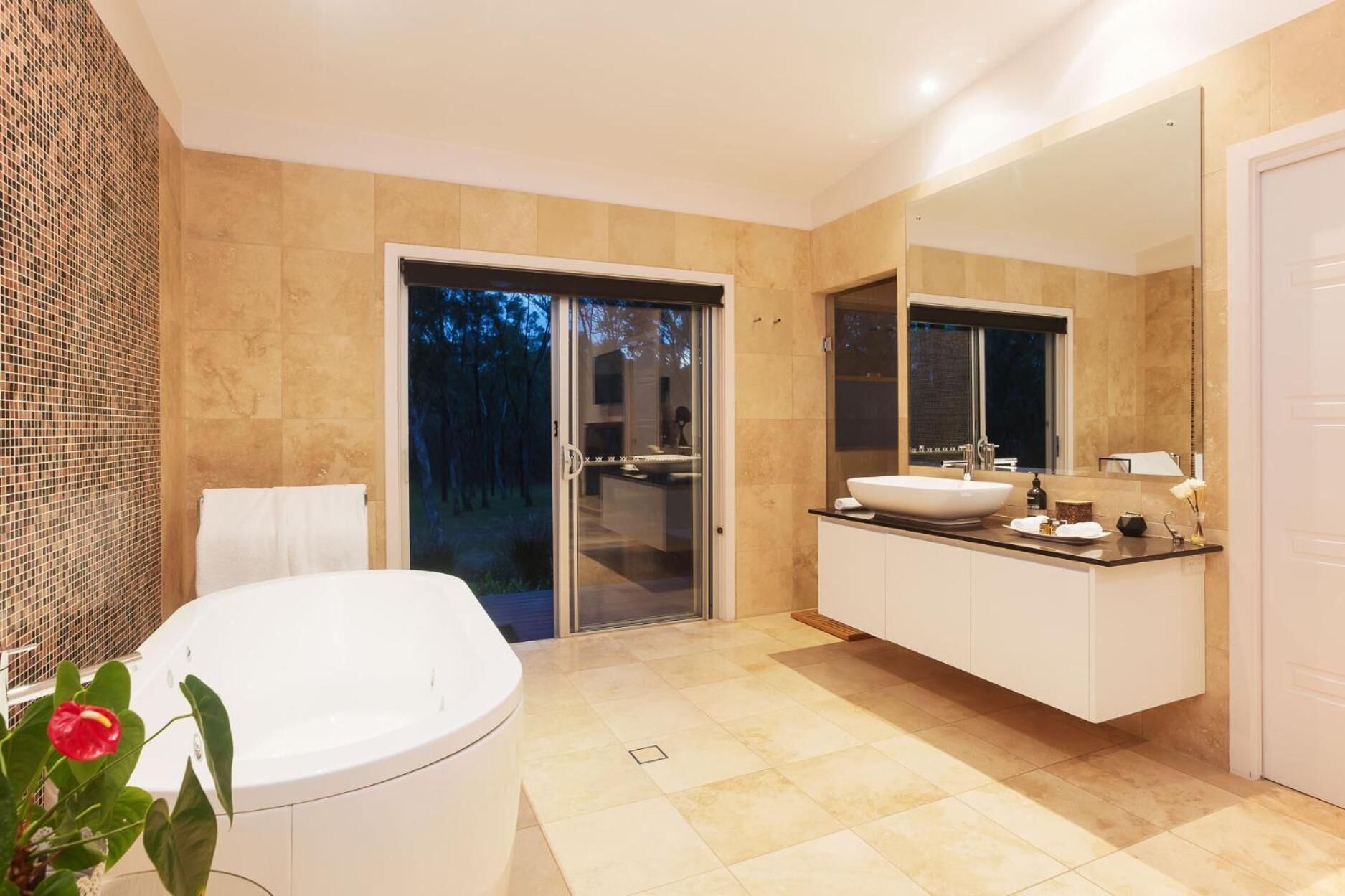 Separate tub and shower, hair dryer, bathrobes, slippers