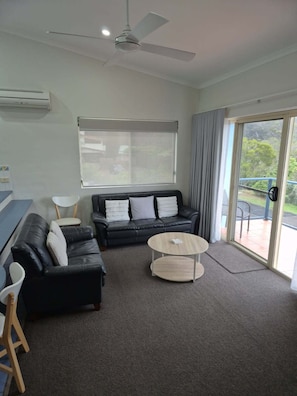 Apartment 3: Upstairs - 2 Bedrooms | Living area | 48-cm flat-screen TV with digital channels, plasma TV, Netflix