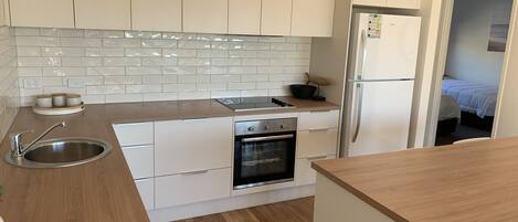 Standard Apartment, 2 Bedrooms, Non Smoking, Kitchen (/2BTHRM/SPA - 5) | Private kitchen | Fridge, microwave, oven, stovetop