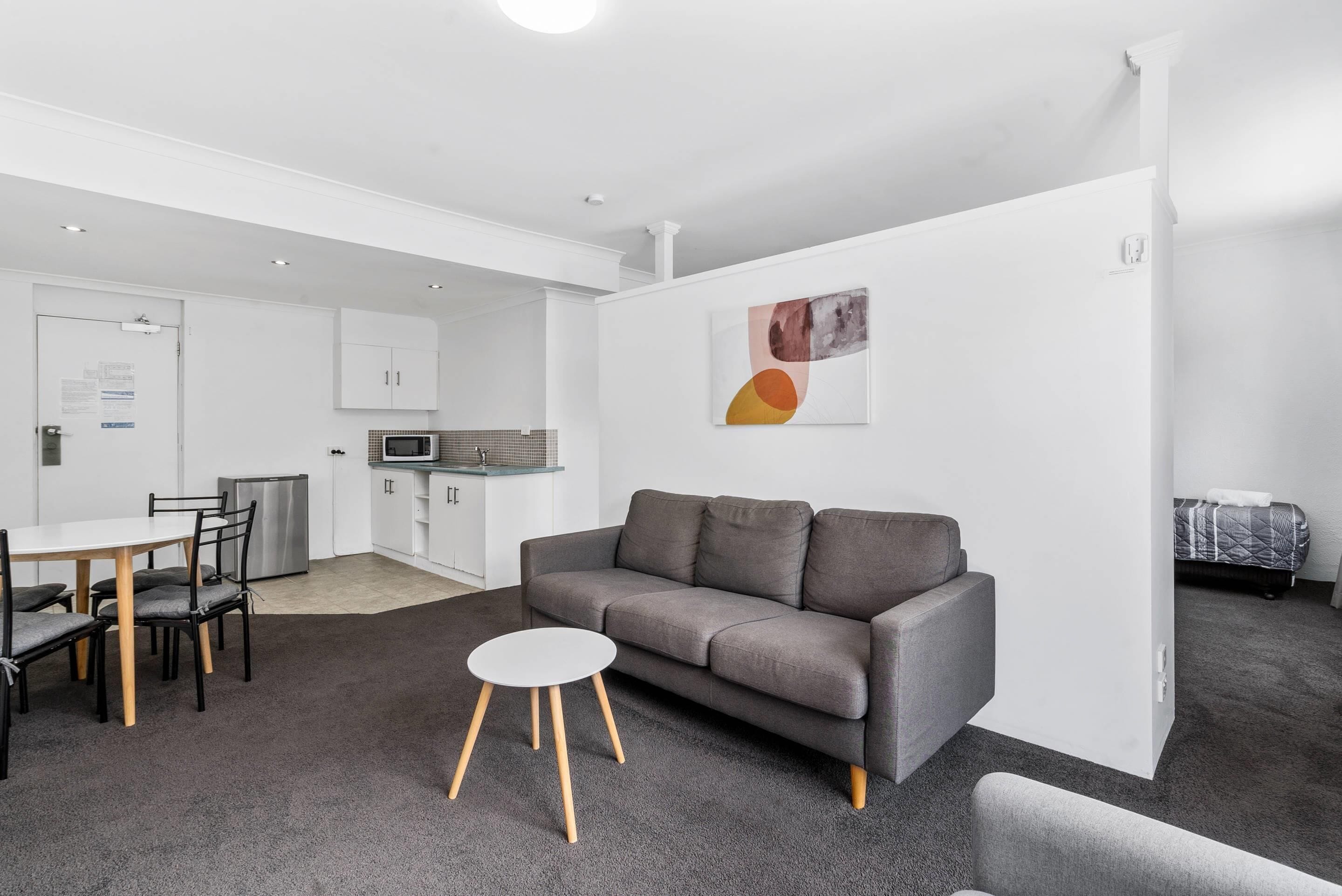 Family Room, Multiple Beds, Non Smoking | Desk, laptop workspace, blackout drapes, iron/ironing board