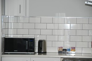 Fridge, microwave, electric kettle, toaster