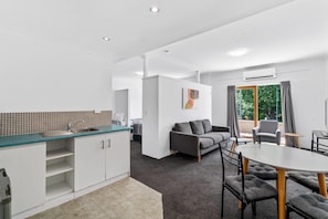Family Room, Multiple Beds, Non Smoking | Desk, laptop workspace, blackout curtains, iron/ironing board
