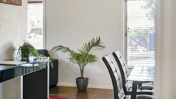 Executive Apartment | Living room | 38-inch flat-screen TV with digital channels, TV