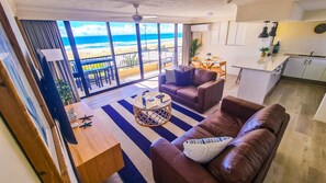 Standard 2 Bedroom Apartment | Living area | 55-inch flat-screen TV with digital channels, TV, DVD player - Pelican Sands Beach Resort (Tugun)