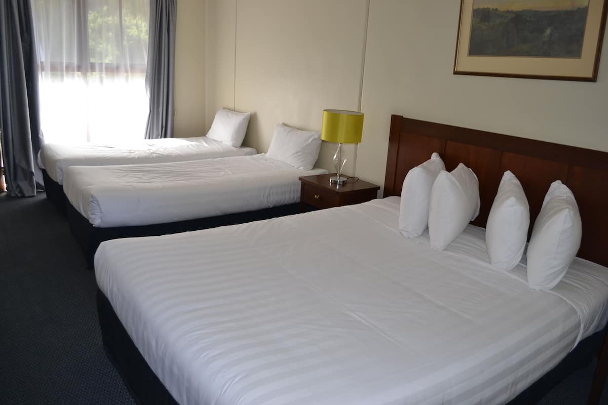 Standard Family Room | Desk, iron/ironing board (on request), free WiFi, bed sheets