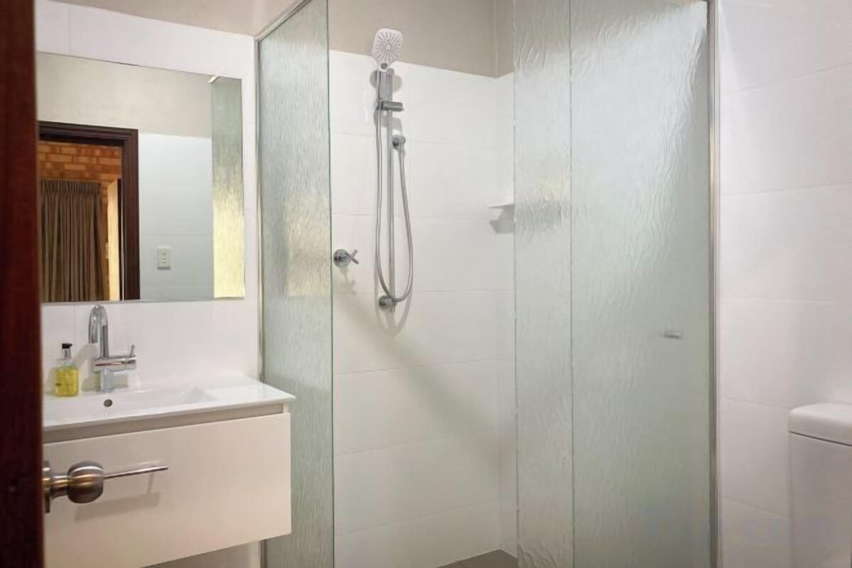 Bathroom | Shower, hair dryer, towels