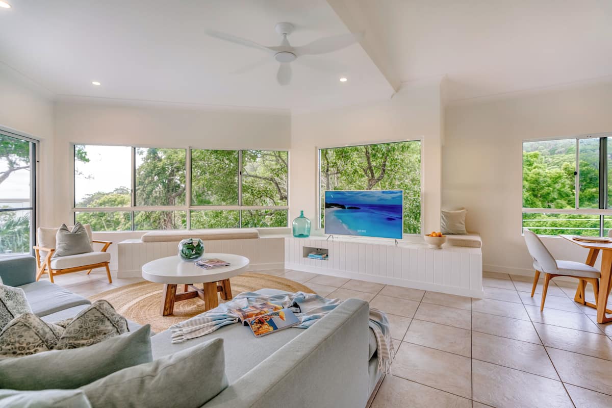 Premier Apartment | Living area | 42-inch flat-screen TV with digital channels, plasma TV, DVD player