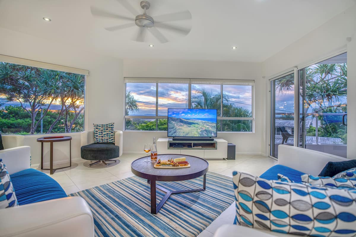 Premier Apartment | Living area | 42-inch flat-screen TV with digital channels, plasma TV, DVD player