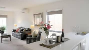 Peppercorn Villa - Offsite 600m from Hotel | Living area | Flat-screen TV